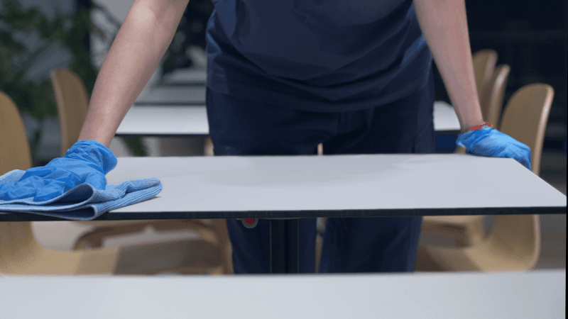 Cleaning table with blue cloth