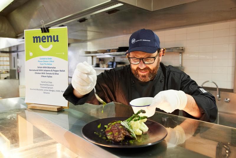 Roy Hill mining village, chef serving WA