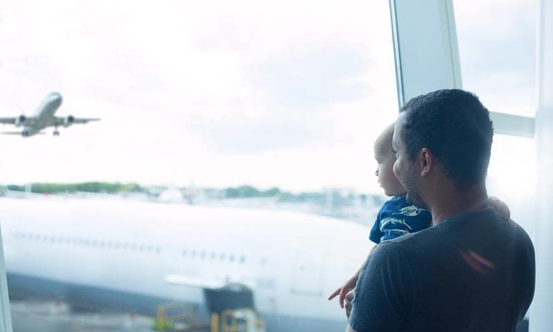 Father and son at the airport