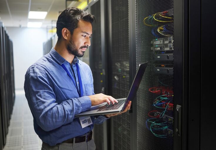 Web_Mobile-Man, engineering laptop and data center, server room inspection or system solution, coding and business network. IT person on computer for
