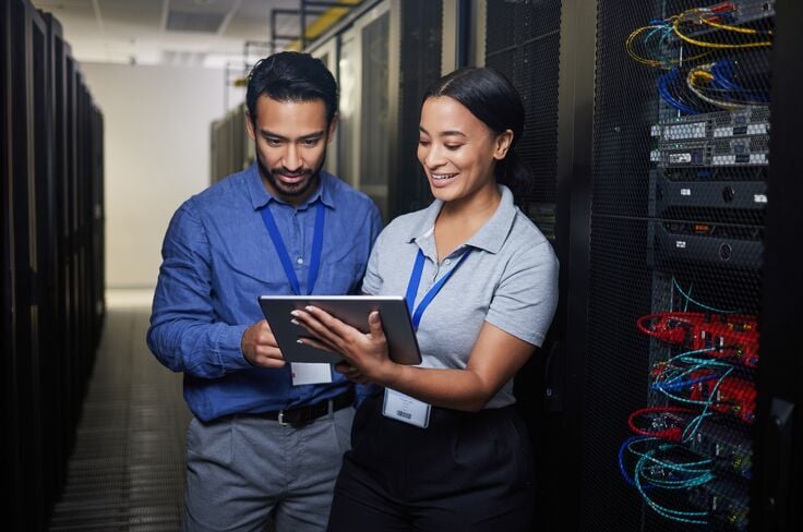 Web_Mobile-People, manager and tablet for server room, cybersecurity, engineering, programming or coding solution. Business man and woman in data cen