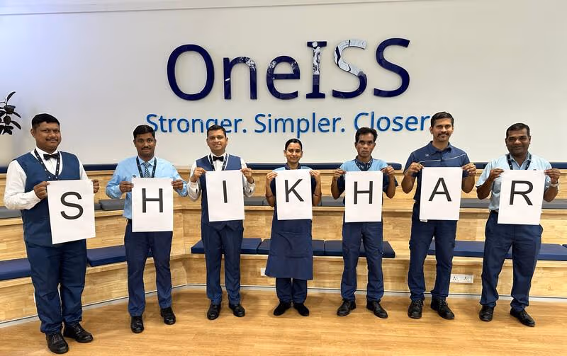 webimage-OneISS-Group-of-people-spelling-out-word-crop-1